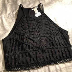 Black cropped tank. Perfect for a night out!